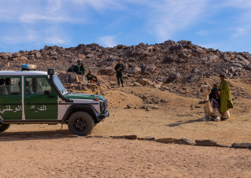 Toutists police escort with tuaregs in the desert, North Africa, Tamanrasset, Algeria