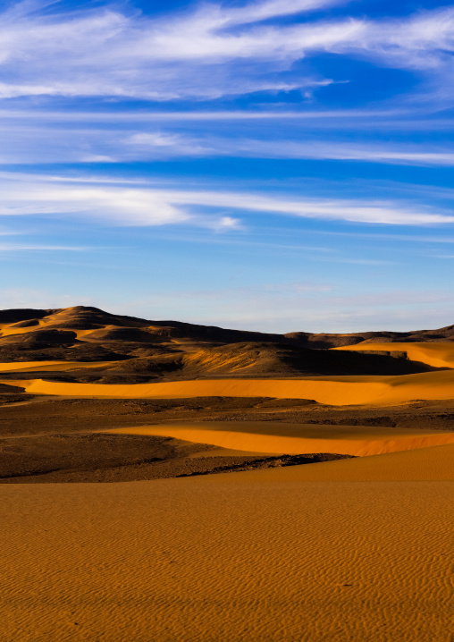 Rocks and sand dunes in Sahara desert, Tassili N'Ajjer National Park, Tadrart Rouge, Algeria