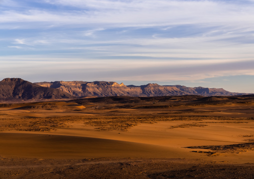 Rocks and sand dunes in Sahara desert, Tassili N'Ajjer National Park, Tadrart Rouge, Algeria