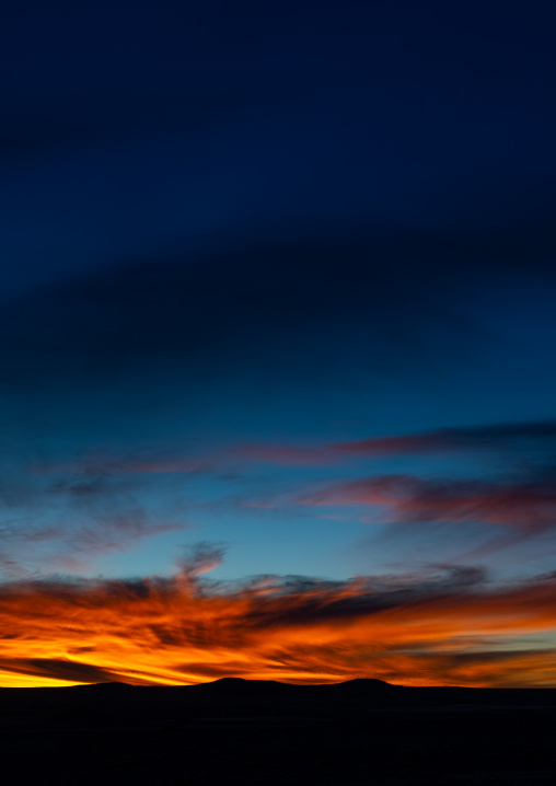 Sunset over the sand dunes in the desert, Tassili N'Ajjer National Park, Tadrart Rouge, Algeria