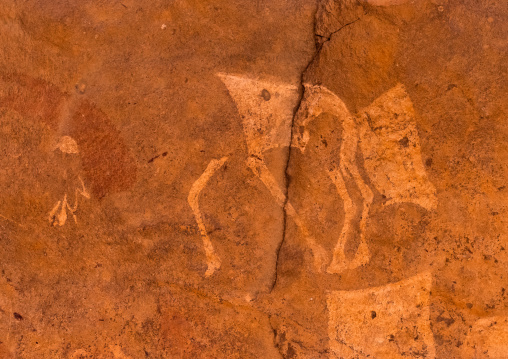 Rock painting depicting a cow, Tassili N'Ajjer National Park, Tadrart Rouge, Algeria