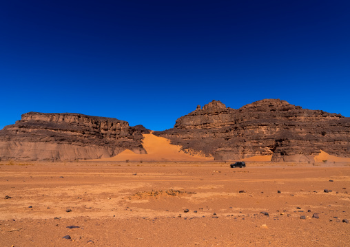 Rocks and sand dunes in Sahara desert, Tassili N'Ajjer National Park, Tadrart Rouge, Algeria