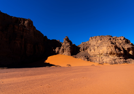 Rocks and sand dunes in Sahara desert, Tassili N'Ajjer National Park, Tadrart Rouge, Algeria