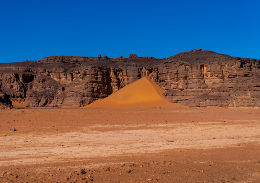 Rocks and sand dunes in Sahara desert, Tassili N'Ajjer National Park, Tadrart Rouge, Algeria