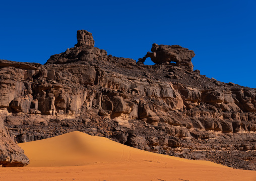 Rocks and sand dunes in Sahara desert, Tassili N'Ajjer National Park, Tadrart Rouge, Algeria