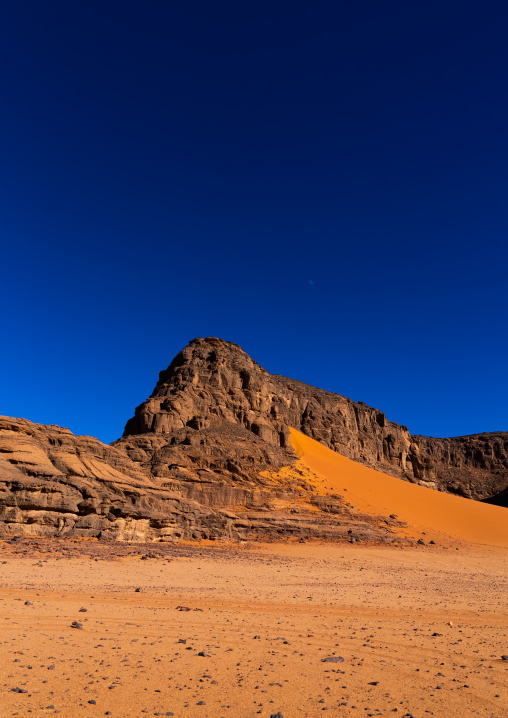 Rocks and sand dunes in Sahara desert, Tassili N'Ajjer National Park, Tadrart Rouge, Algeria