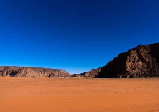 Rocks and sand dunes in Sahara desert, Tassili N'Ajjer National Park, Tadrart Rouge, Algeria