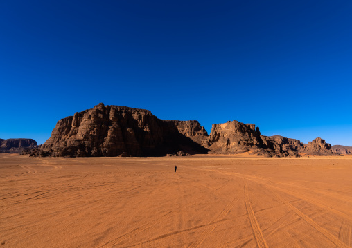 Rocks and sand dunes in Sahara desert, Tassili N'Ajjer National Park, Tadrart Rouge, Algeria