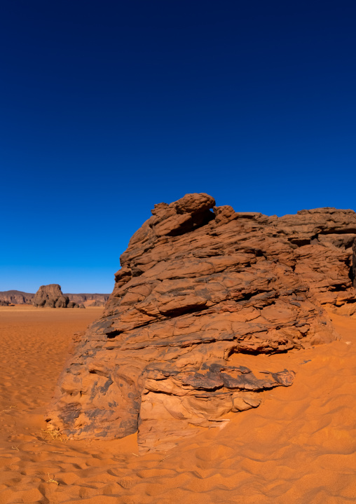 Rocks and sand dunes in Sahara desert, Tassili N'Ajjer National Park, Tadrart Rouge, Algeria