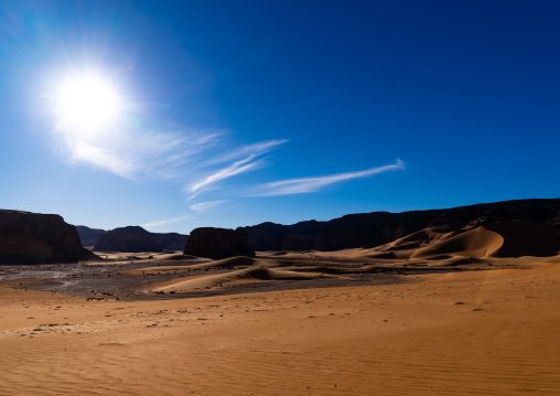 Rocks and sand dunes in Sahara desert, Tassili N'Ajjer National Park, Tadrart Rouge, Algeria