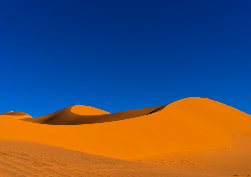 Sand dunes in the Sahara desert, Tassili N'Ajjer National Park, Tadrart Rouge, Algeria