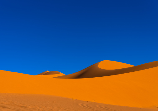 Sand dunes in the Sahara desert, Tassili N'Ajjer National Park, Tadrart Rouge, Algeria