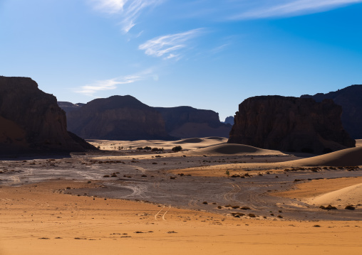 Rocks and sand dunes in Sahara desert, Tassili N'Ajjer National Park, Tadrart Rouge, Algeria