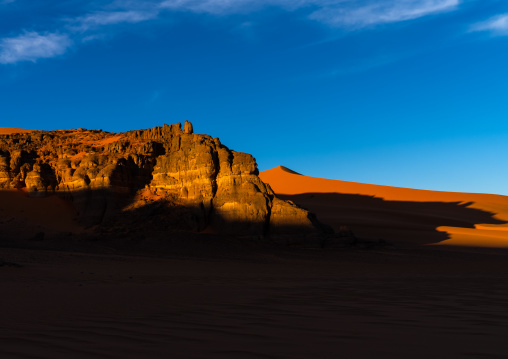 Rocks and sand dunes in Sahara desert, Tassili N'Ajjer National Park, Tadrart Rouge, Algeria