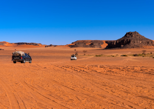 Rocks and sand dunes in Sahara desert, Tassili N'Ajjer National Park, Tadrart Rouge, Algeria