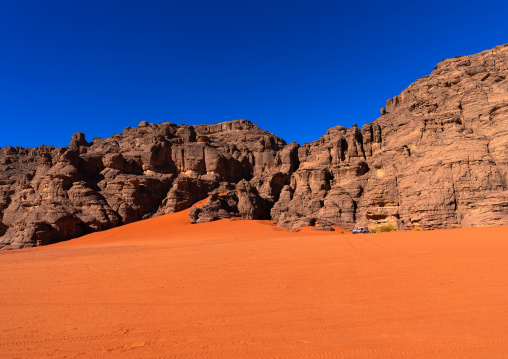 Rocks and sand dunes in Sahara desert, Tassili N'Ajjer National Park, Tadrart Rouge, Algeria