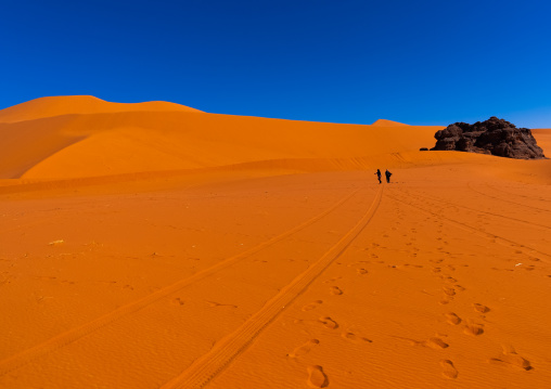 Rocks and sand dunes in Sahara desert, Tassili N'Ajjer National Park, Tadrart Rouge, Algeria