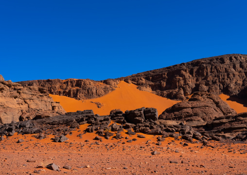 Rocks and sand dunes in Sahara desert, Tassili N'Ajjer National Park, Tadrart Rouge, Algeria