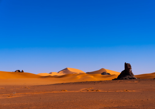 Rocks and sand dunes in Sahara desert, Tassili N'Ajjer National Park, Tadrart Rouge, Algeria