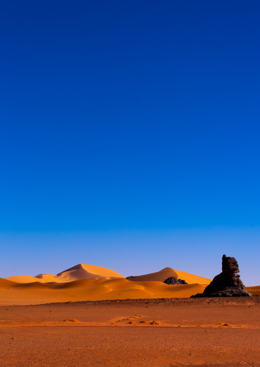 Rocks and sand dunes in Sahara desert, Tassili N'Ajjer National Park, Tadrart Rouge, Algeria