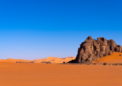 Rocks and sand dunes in Sahara desert, Tassili N'Ajjer National Park, Tadrart Rouge, Algeria