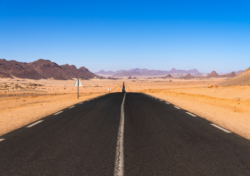 Asphalte road in the desert, North Africa, Erg Admer, Algeria