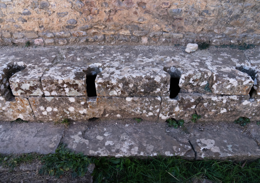 Latrines in the Roman ruins of Djemila, North Africa, Djemila, Algeria