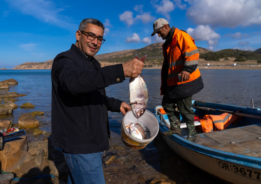 Fisherman in Madagh beach, North Africa, Oran, Algeria