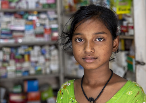 Bangladeshi girl in a pharmacy in Korail slum, Dhaka Division, Dhaka, Bangladesh