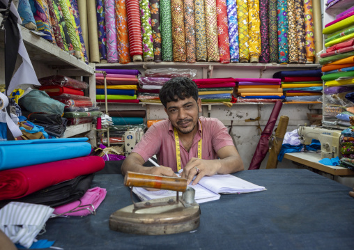 Tailor inside his shop, Dhaka Division, Dhaka, Bangladesh