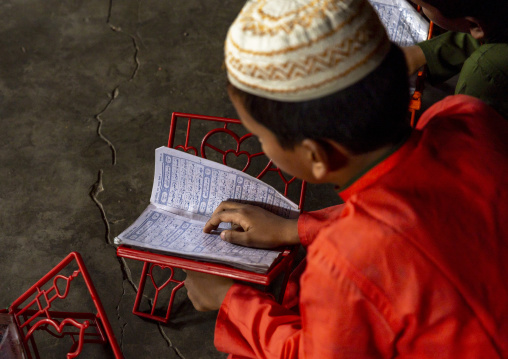 Students reading quran in a coranic school, Dhaka Division, Dhaka, Bangladesh