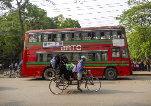 Rickshaw and double decker on the road, Dhaka Division, Dhaka, Bangladesh