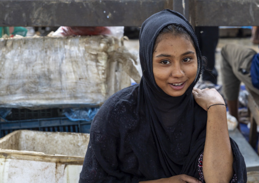 Portrait of a veiled bangladishi girl in Kawran bazar, Dhaka Division, Dhaka, Bangladesh