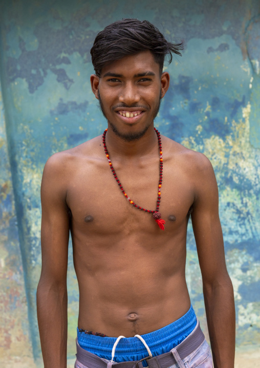 Portrait of a smiling Santal tribe young man, Sylhet Division, Kamalganj, Bangladesh