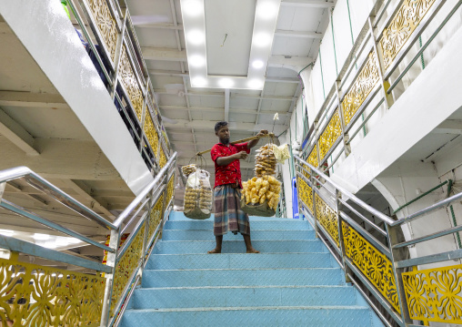 Food seller on the stairs of a ferry to Barisal, Dhaka Division, Dhaka, Bangladesh