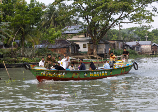 Passengers on a local boat on a river, Barisal Division, Banaripara, Bangladesh