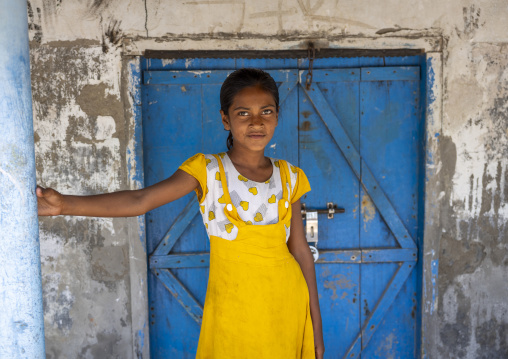 Portrait of girl standing in front of her house, Khulna Division, Shyamnagar, Bangladesh