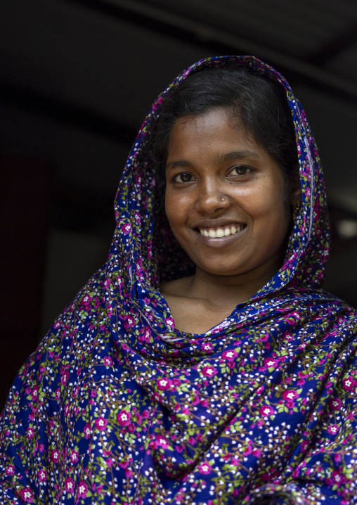 Portrait of a smiling veiled young woman, Khulna Division, Shyamnagar, Bangladesh