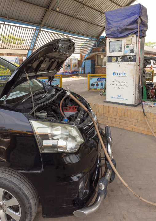 Car charging compressed natural gas in a station, Khulna Division, Bheramara, Bangladesh