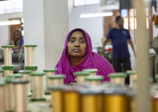 Tired worker in a silk factory, Rajshahi Division, Rajshahi, Bangladesh