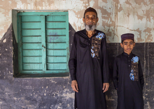 Portrait of bangladeshi father and boy, Rajshahi Division, Manda, Bangladesh