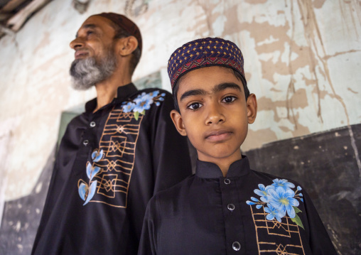 Portrait of bangladeshi father and boy, Rajshahi Division, Manda, Bangladesh