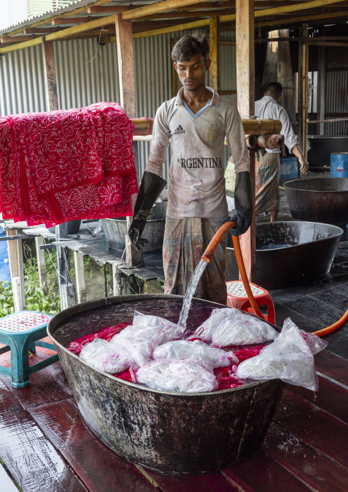 Bangladeshi man working in a batik factory, Dhaka Division, Rupganj, Bangladesh