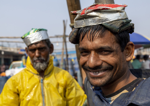 Smiling fish market porters, Chittagong Division, Chittagong, Bangladesh