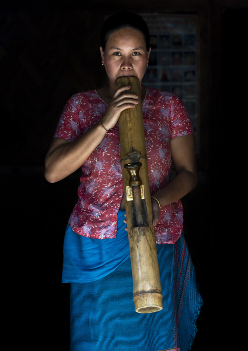 Chakma tribe woman smoking pipe, Chittagong Division, Rangamati Sadar, Bangladesh