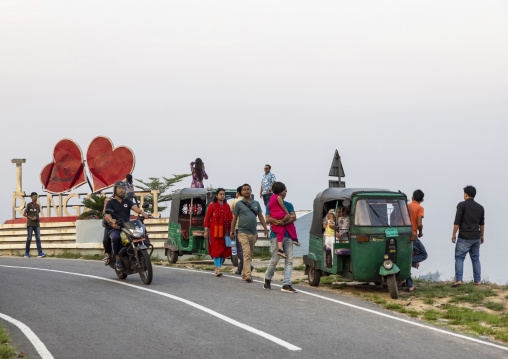 Rickshaws parked near a Rangamati giant billboard, Chittagong Division, Rangamati Sadar, Bangladesh