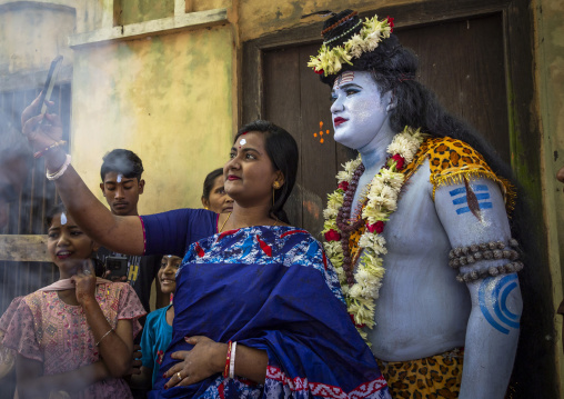 Lord Shiva procession with devotees at Lal Kach festival, Dhaka Division, Tongibari, Bangladesh