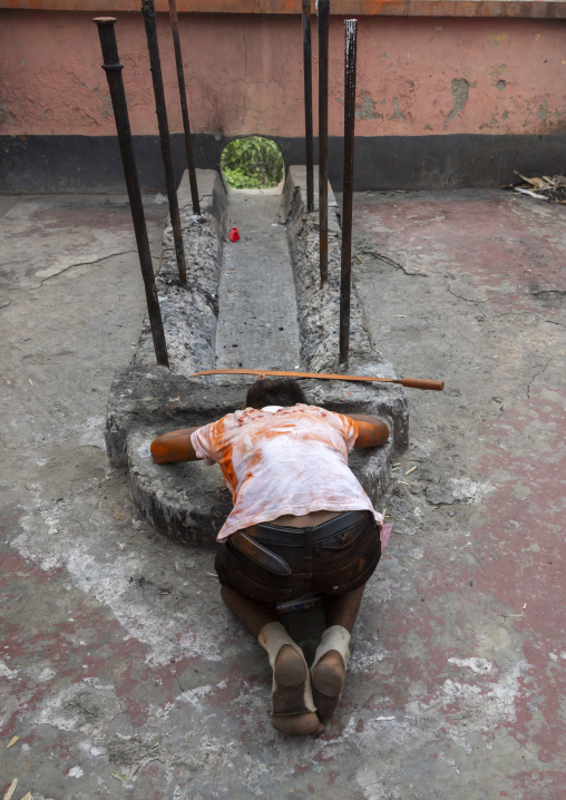 Hindu man praying at cremation site, Dhaka Division, Munshiganj Sadar, Bangladesh