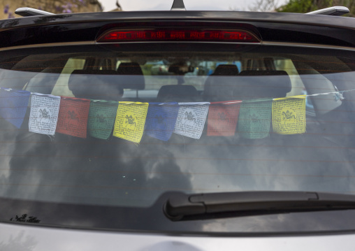 Prayer flags inside a car, Chang Gewog, Thimphu, Bhutan