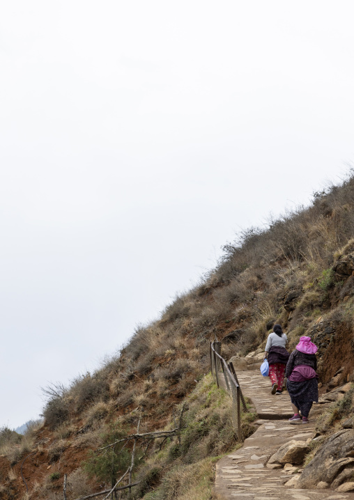 Bhutanese people hiking in the mountain, Paro, Drakarpo, Bhutan